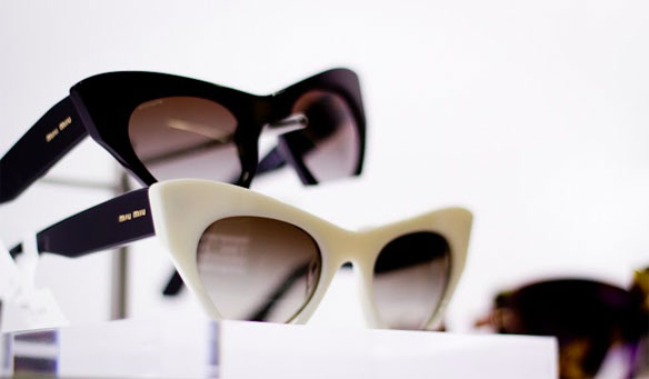 two pairs of fashion glasses in white and black 