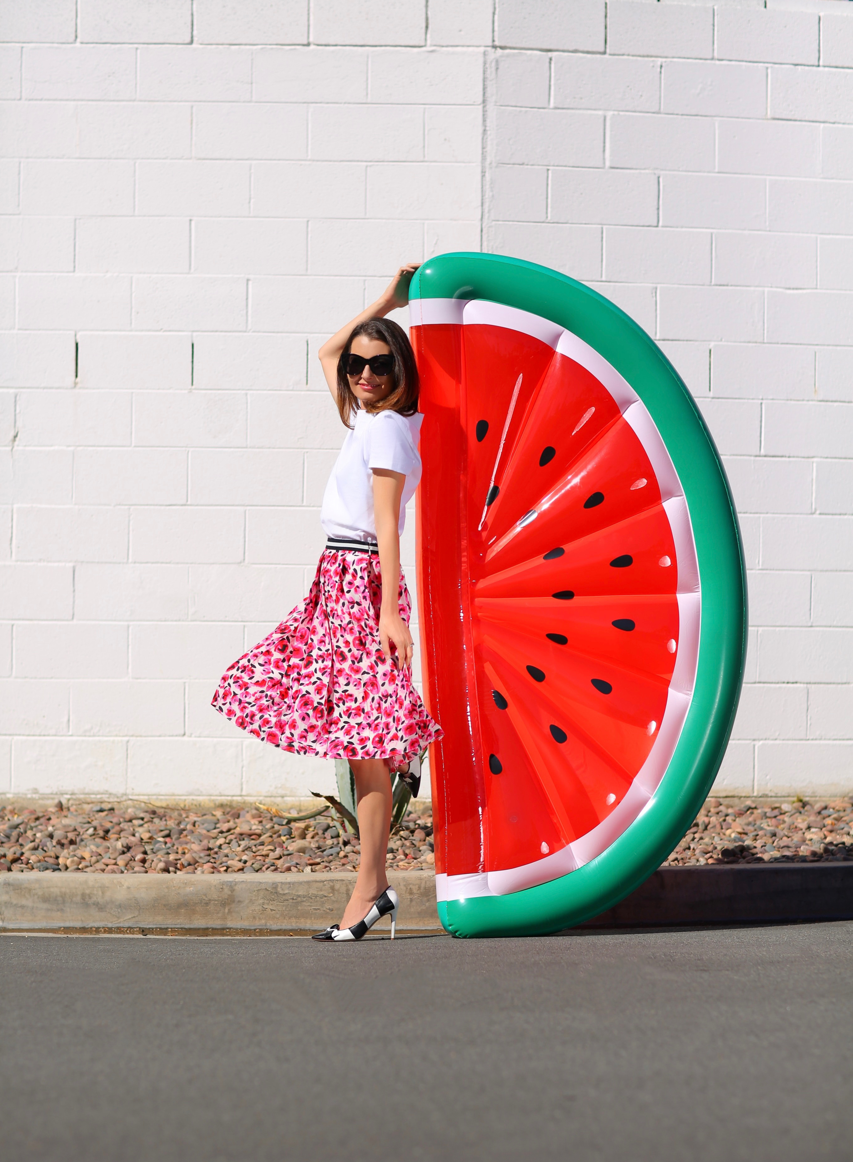 woman holding a watermelon Best Pool Floats 