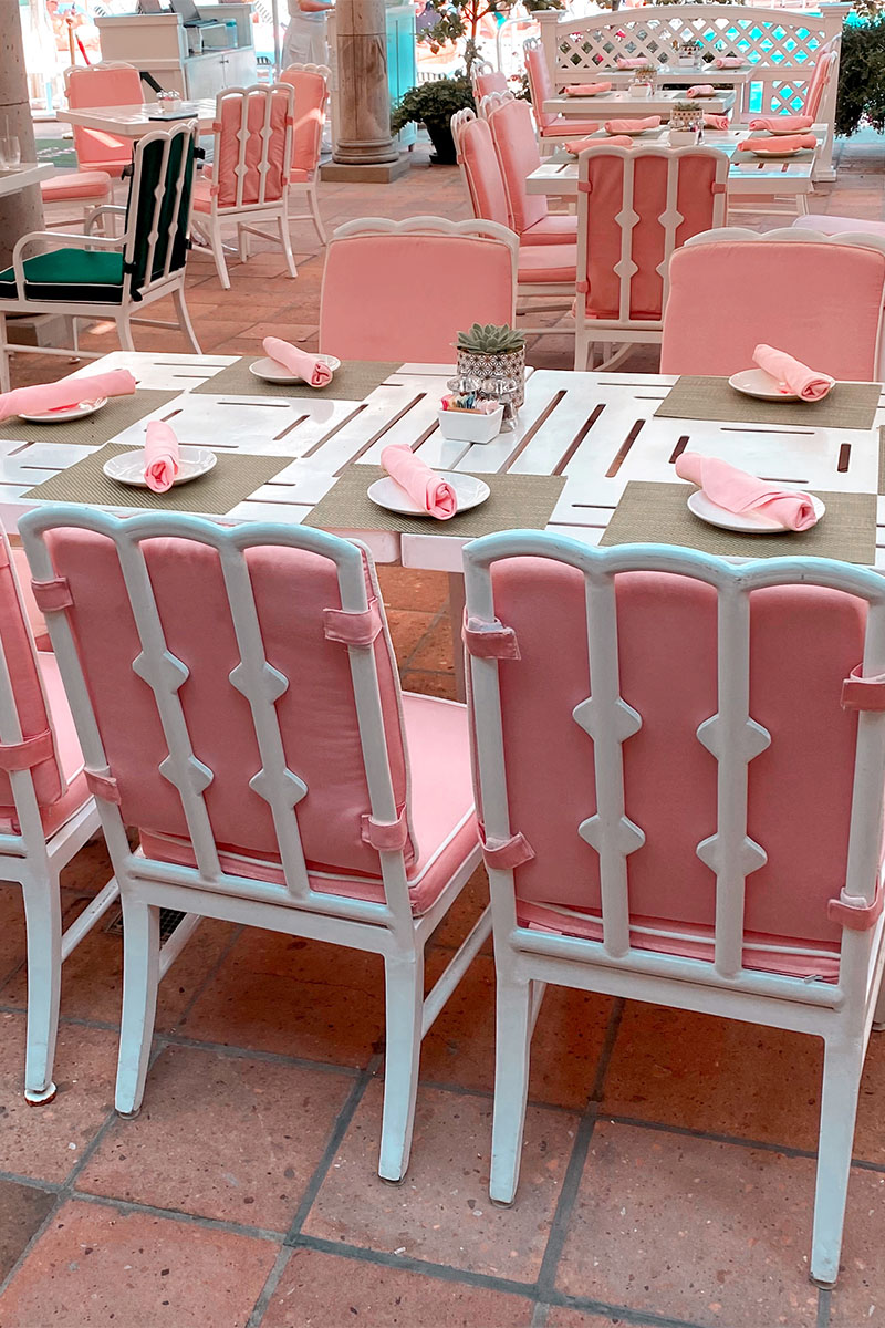 pink chairs for the outdoor dining at The Cabana Cafe