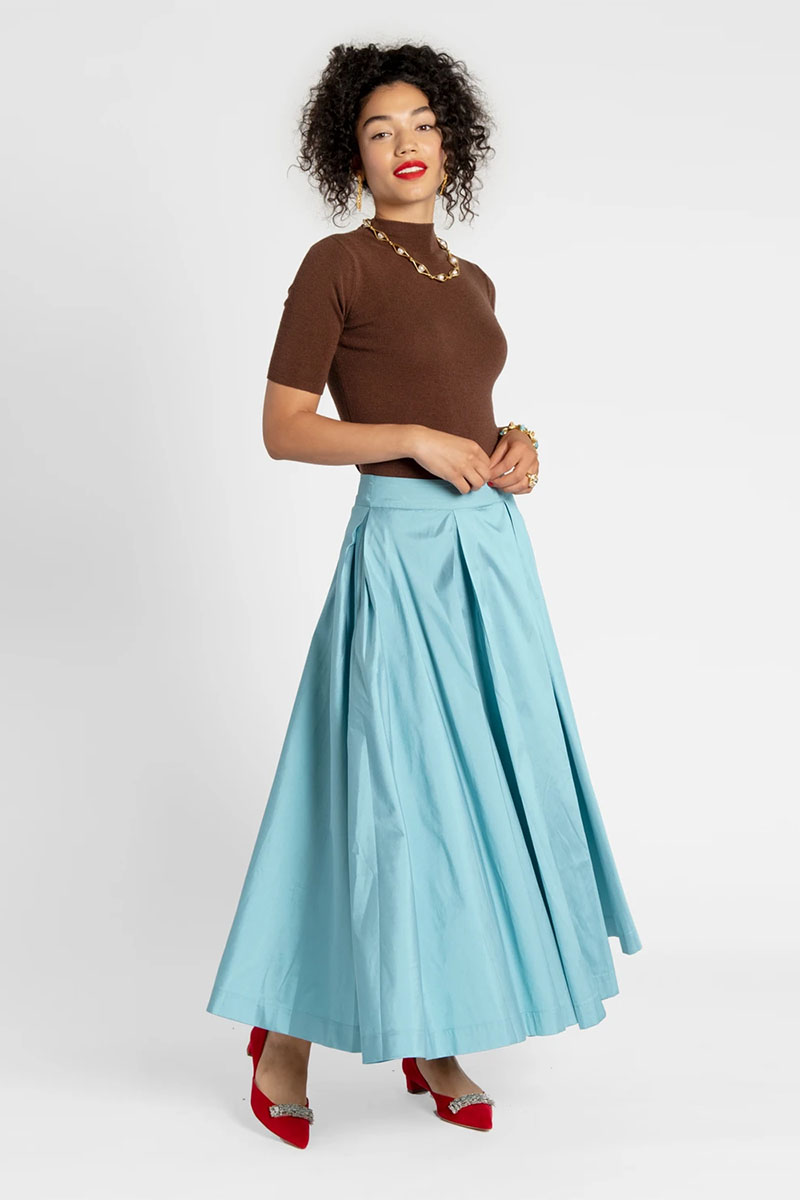 woman wearing blue ballgown skirt