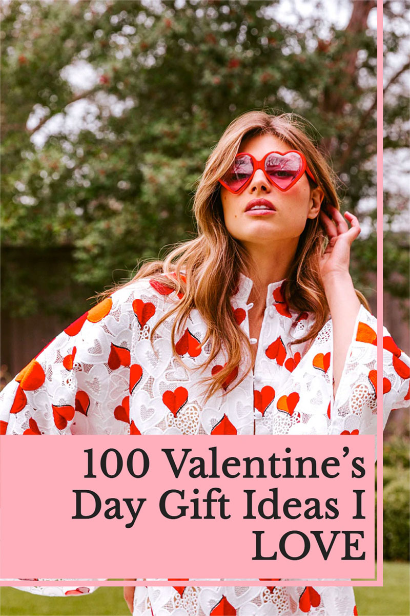 Valentine’s Day Gift Ideas woman wearing heart shaped sunglasses 