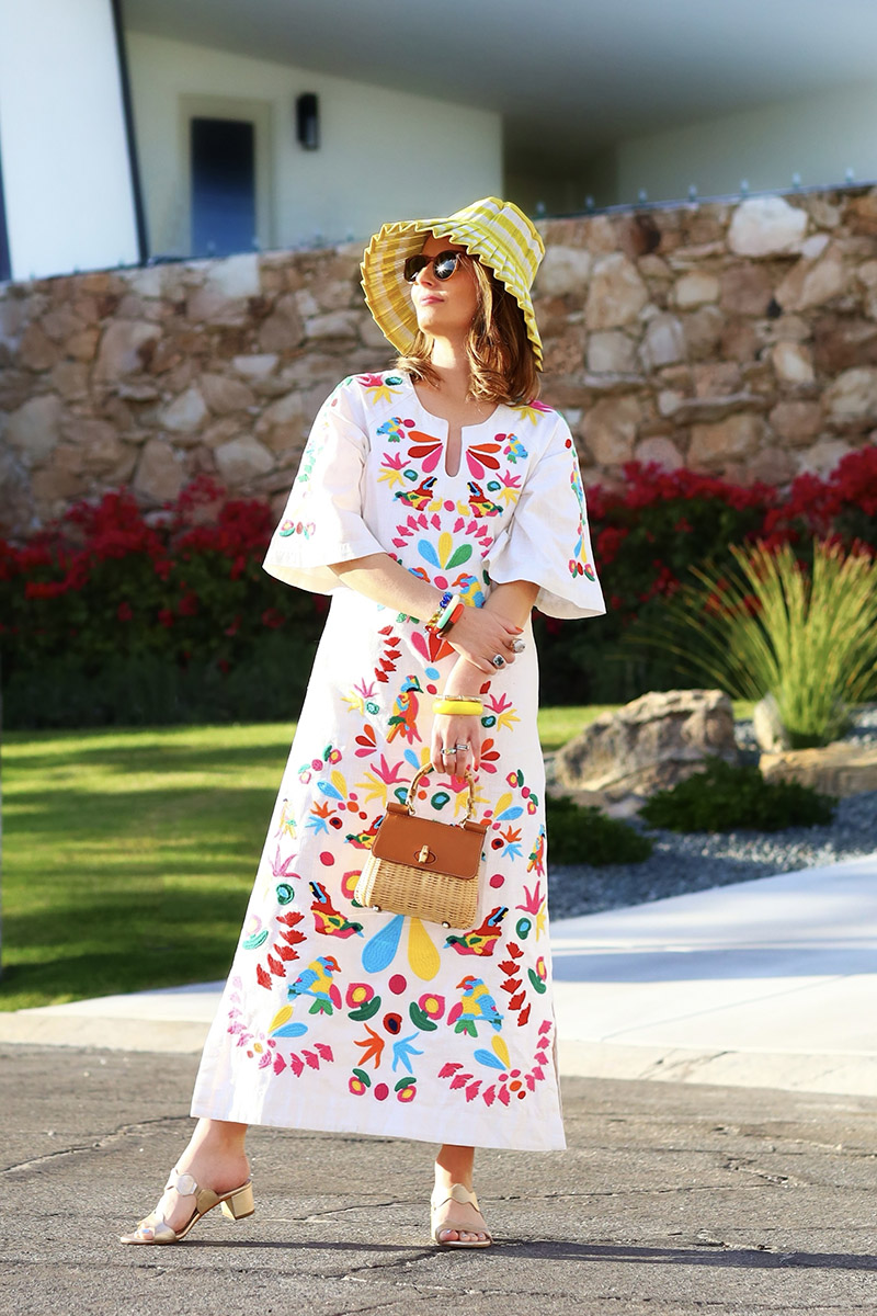 Kelly Golightly Wears a embroidered caftan to Palm Springs in February